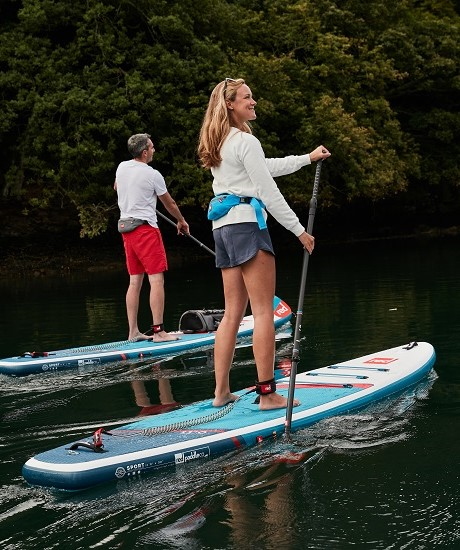 Red Paddle Co SUP lifestyle boating paddling couple Stand Up Surf Shop 460x550