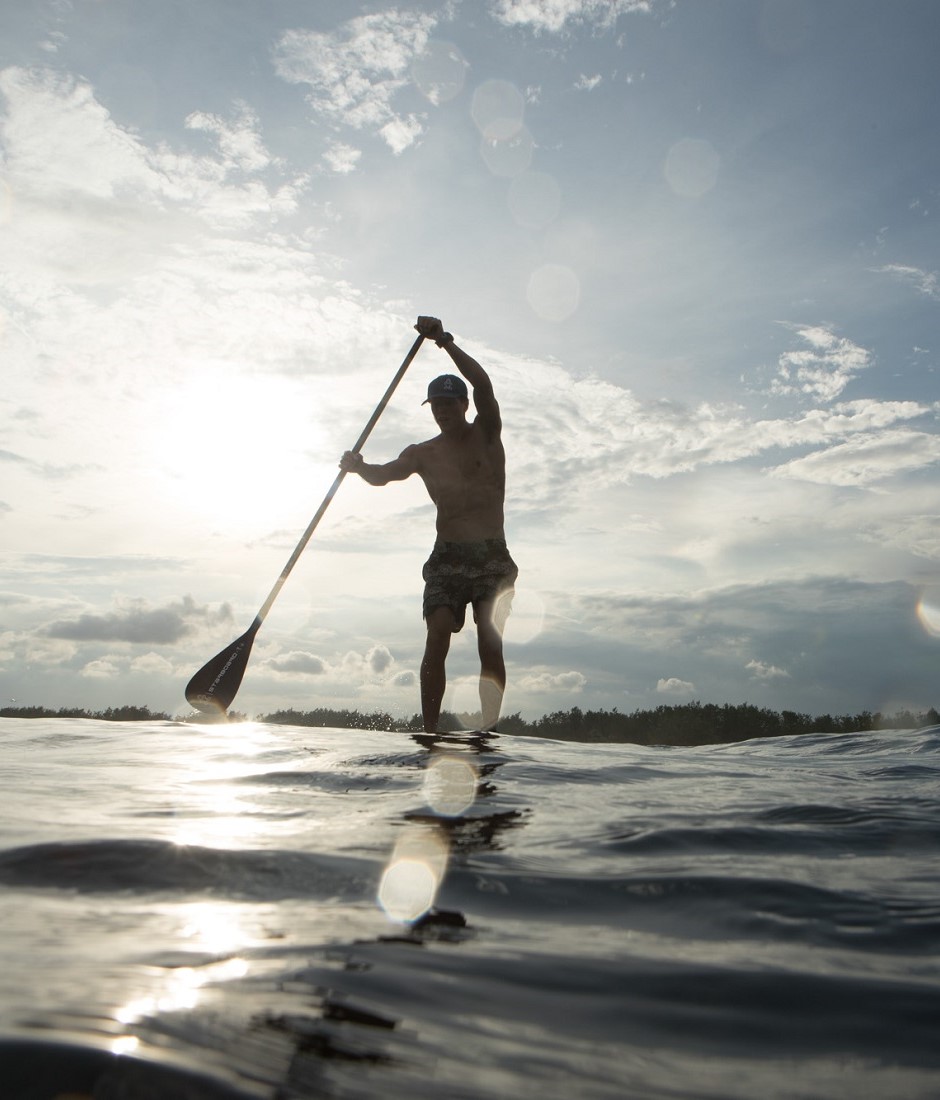 starboard man paddling learn to SUP stand up surf shop 940x1100